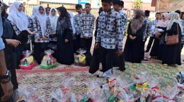 Marsekal Muda TNI (Purn.) Fachri Adamy Serahkan Sedekah pada Penutupan Pendidikan Ramadhan SMAN 1 Lhokseumawe