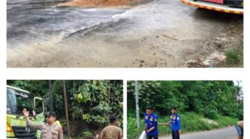 RESPON CEPAT PERSONEL POLSEK KEJURUAN MUDA TANGANI TUMPAHAN CPO DI JALAN LINTAS NASIONAL BUKIT SEUMADAM